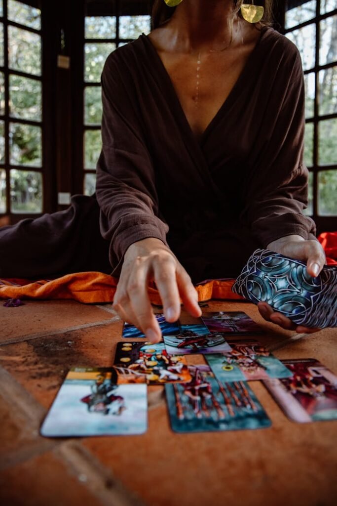 A Person using Tarot Cards